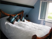 Lake view bedroom at Watersmeet carp lake in France.