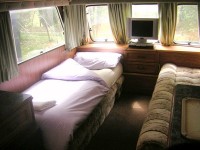 Set as single bed (other options for bedding not shown are 2 x singles or 1 x large double). at Joy Lake carp lake in France.
