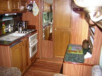 Kitchen Area leading to bathroom at Joy Lake carp lake in France.