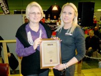 Linda collects the award at the Carp society conference