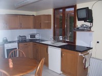 Full cooking facilities inside at Lillypool carp lake in France.