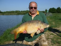A 23lb Carp from Roseau Large Lake in May 2012 by Keith