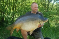 A 60lb Carp from Laroussi in May 2012 by Kenneth Anderson