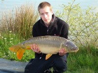 A 22lb Carp from Malvoisine in Apr 2012 by TONY