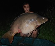 A 57lb Carp from Laroussi in Jun 2012 by Mark Yuen