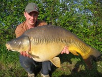 A 28lb Carp from Commons in May 2012 by James Grimsdale