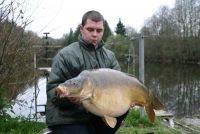 A 30lb Carp from  in Apr 2006 by Martin catches the same 30lb 8oz Carp as Andy. The Carp is obviously star struck.