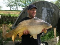 A 40lb Carp from Boomerang in May 2012 by Mr Philip Scillitoe