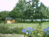 The lakeside cabin at Lac du Val carp lake in France. 