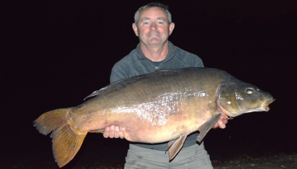My 52.8 Mirror. I was to see this fish again in November, note the bottom cluster of scales above fin.