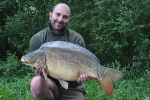 Angling Lines Field Tester Mike Linstead with a carp from Blue Lake, France