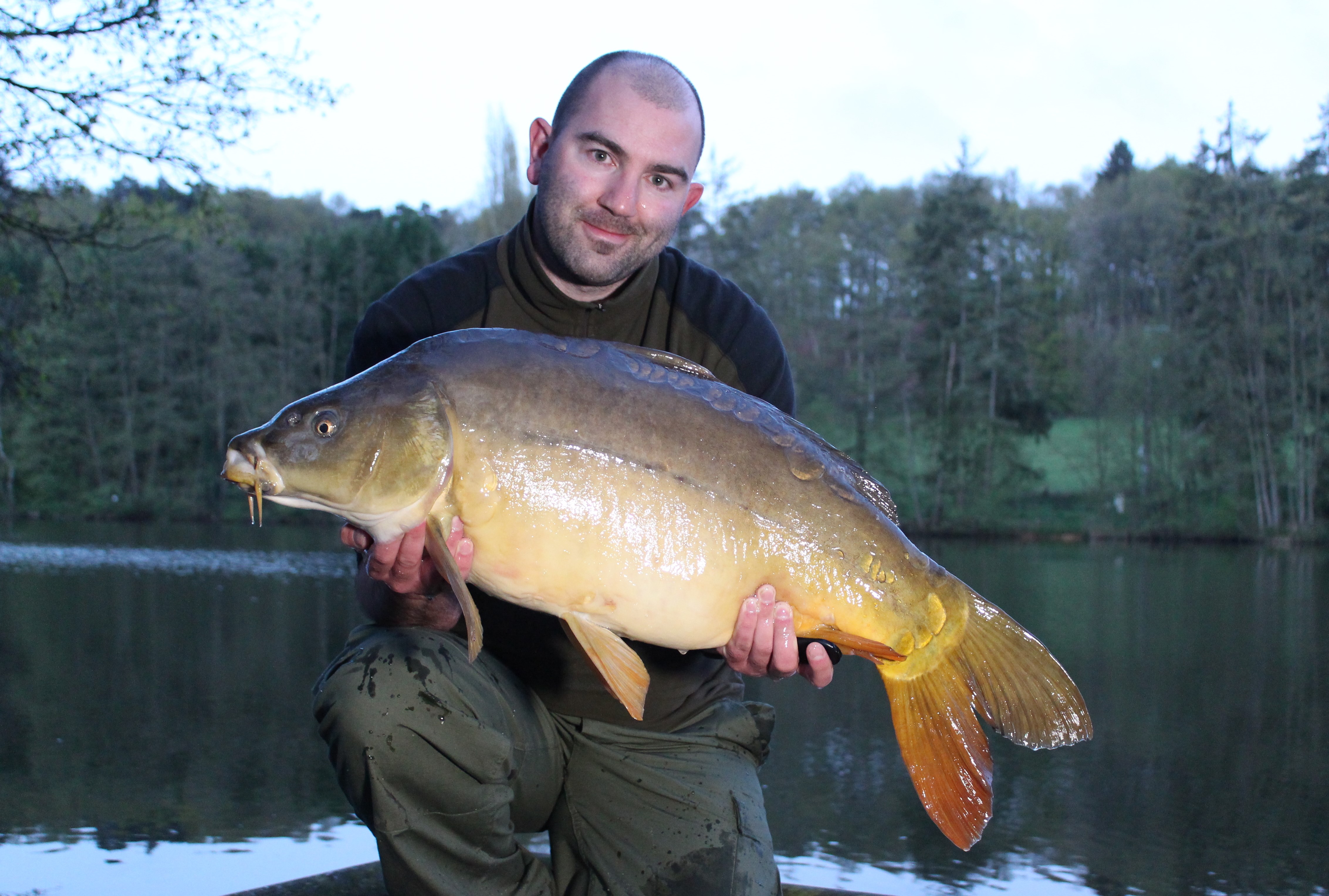 Mike Linstead, Angling Lines Field Tester, with a French mirror carp from La Fonte