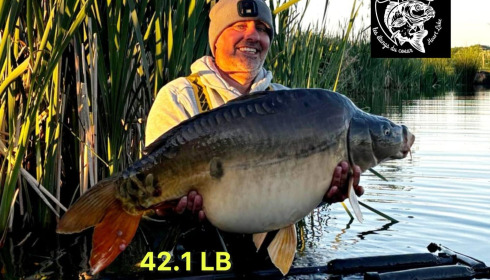 A 42 lb 1 oz carp from Heart Lake, Jul 2025