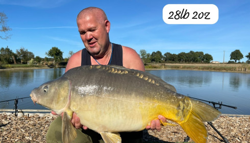 A 28 lb 2 oz carp from Heart Lake, Sep 2026
