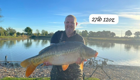 A 27 lb 12 oz carp from Heart Lake, Sep 2026
