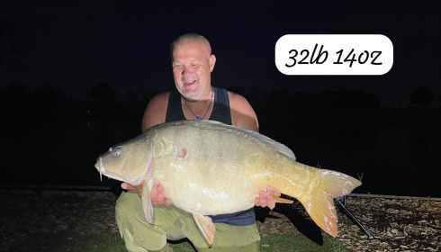 A 32 lb 14 oz carp from Heart Lake, Sep 2026