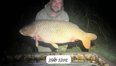A 39 lb 12 oz carp from Heart Lake, Sep 2026