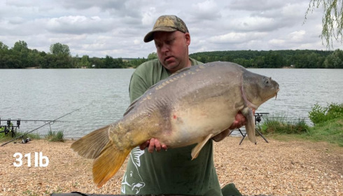 A 31 lb carp from Lepinet South, glenn hook - lloyd goodman, Jul 2020