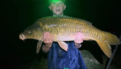A 32 lb carp from Mystique, Teejays first BP, Jun 2026