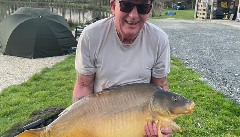 A 34 lb carp from Mystique, John law, Apr 2025