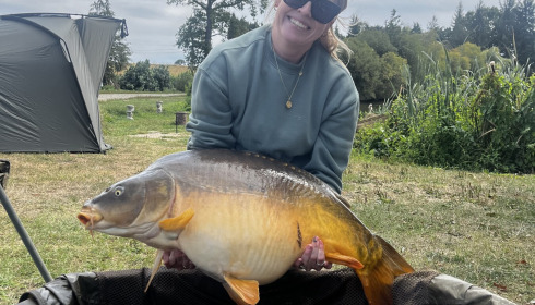 A 42 lb 5 oz carp from Mystique, Aug 2026