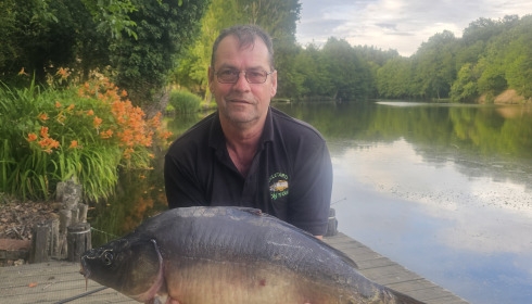 A 8 oz carp from Linstant, 19lb mirror, May 2026