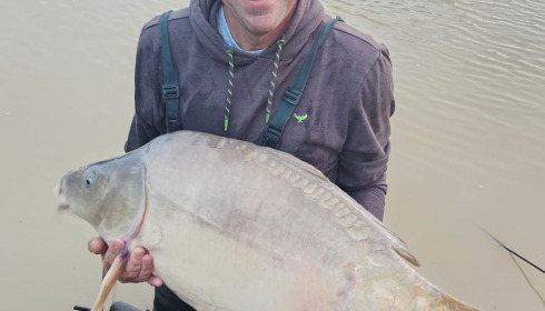 A 52 lb carp from Maniere, 52lb and new PB, Jun 2026