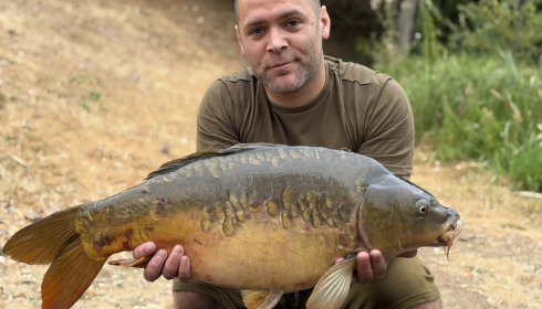 A 23 lb carp from Cerises, Mirror, Jul 2026