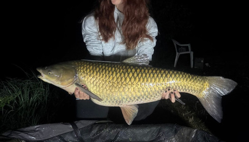 A 35 lb grass carp from Cerises, Aug 2026