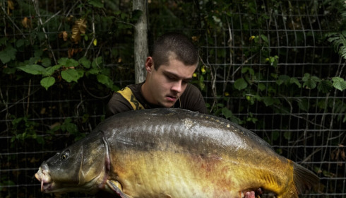 A 35 lb 3 oz carp from Bears Lake, Beautiful dark mirror one of my first fish, Aug 2026