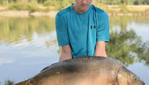 A 42 lb 14 oz carp from Carrouge, Aug 2026