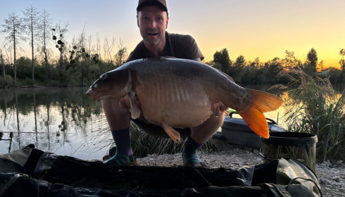 A 32 lb carp from Grandes Cimes, Buschell, Jul 2026