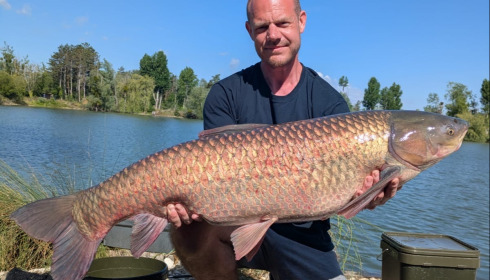 A 37 lb grass carp from Grandes Cimes, Buschell, Jul 2026