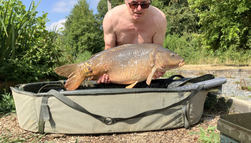 A 38 lb 9 oz carp from Carp House, Caught at the hottest part of the day, Jul 2026