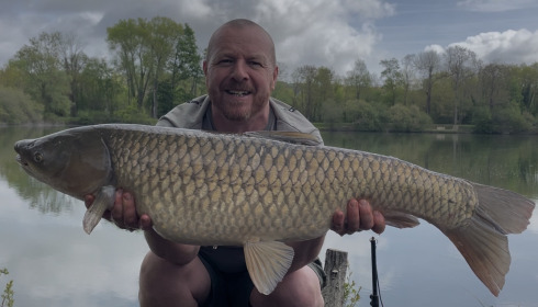 A 26 lb grass carp from Duquesne, Apr 2026