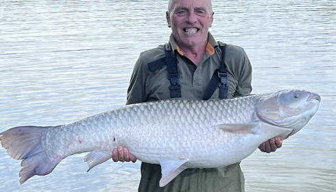 A 56 lb 9 oz grass carp from Jonchery, Jun 2026