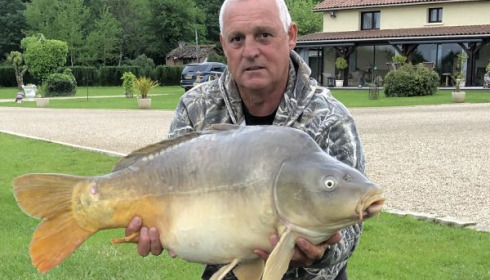 A 40 lb carp from Landes, Lake owner Tony, May 2020