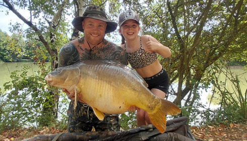 A 55 lb carp from Lillybelle, Aug 2026