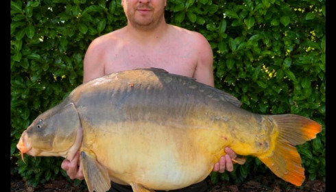 A 55 lb carp from Lillybelle, Aug 2026