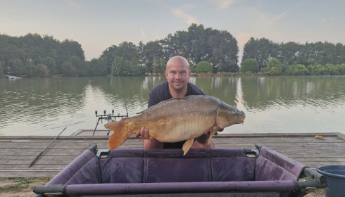 A 39 lb carp from Landes, Mirror, Aug 2026