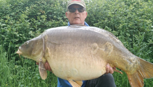 A 45 lb 8 oz carp from Lepinet South, TOMLINSON, May 2025