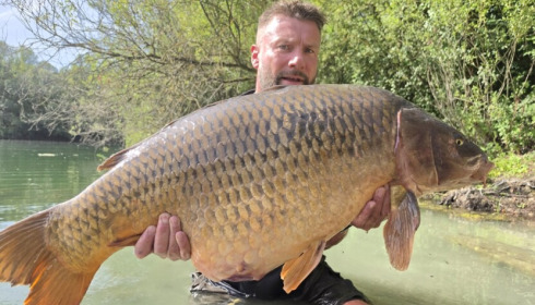 A 56 lb 12 oz carp from Evaro, Jul 2026