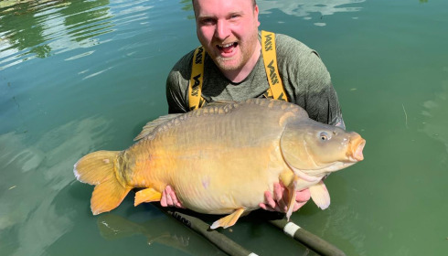 A 61 lb fish from Eau De Vie South, Dans lake record, Apr 2024