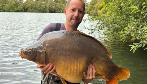 A 54 lb carp from Emeraude, Jul 2025