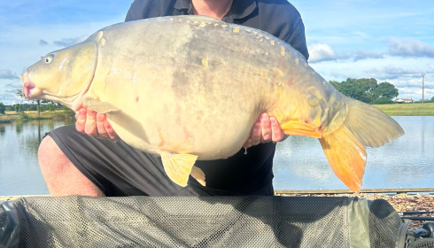 A 34 lb 9 oz carp from Heart Lake, Ian Rosewell, Jun 2024
