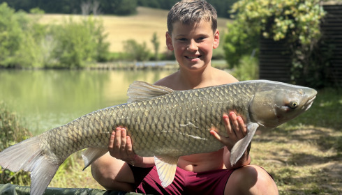 A 20 lb fish from Mas Bas Lotus Lake, One of many Grass, May 2024