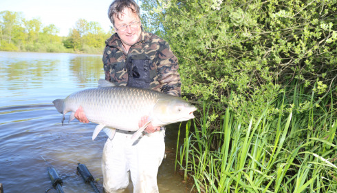 A 46 lb 4 oz fish from Brie, Grass Carp 46.4 (note that I was standing in the water for this photo), Apr 2022