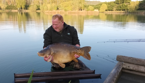 A 35 lb fish from Deux Iles, Martin with a big framed mirror, Apr 2022