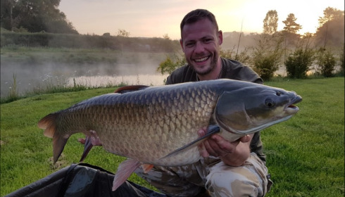 A 32 lb 12 oz grass carp from Deux Iles, Jadi Wright, May 2019