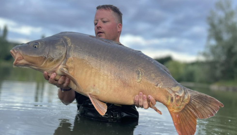 A 47 lb 12 oz carp from Deux Iles, Jul 2023